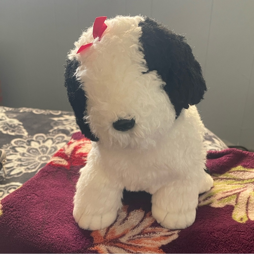 Plush Black & White Puppy Toy with Red Bow her name is Poofie